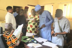 Political Parties Examine Logos on Ballot Paper Specimens Ahead December 29 Local Government Election